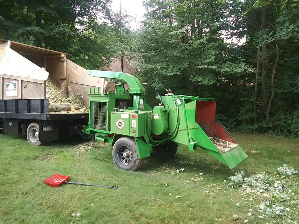 Miller’s Tree Service professional tree chipping equipment shown here.